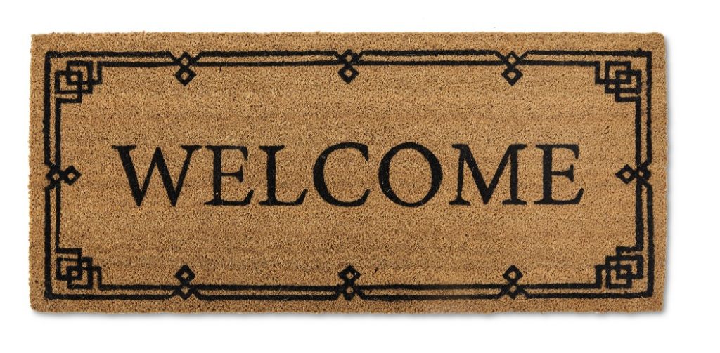 large doormat with the word welcome block text