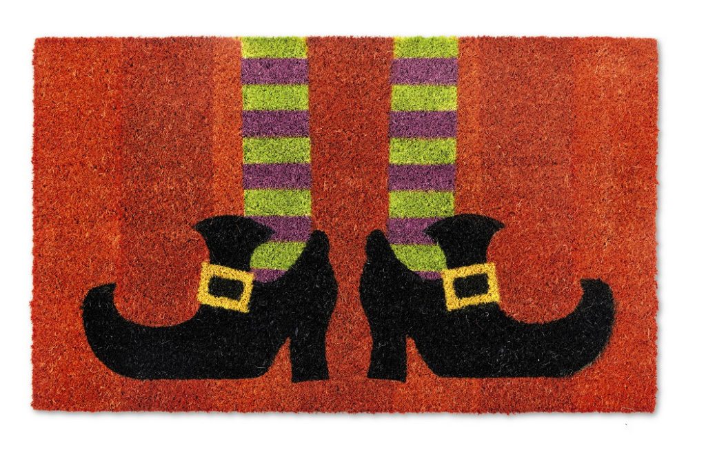 front doormat with witch's feet 