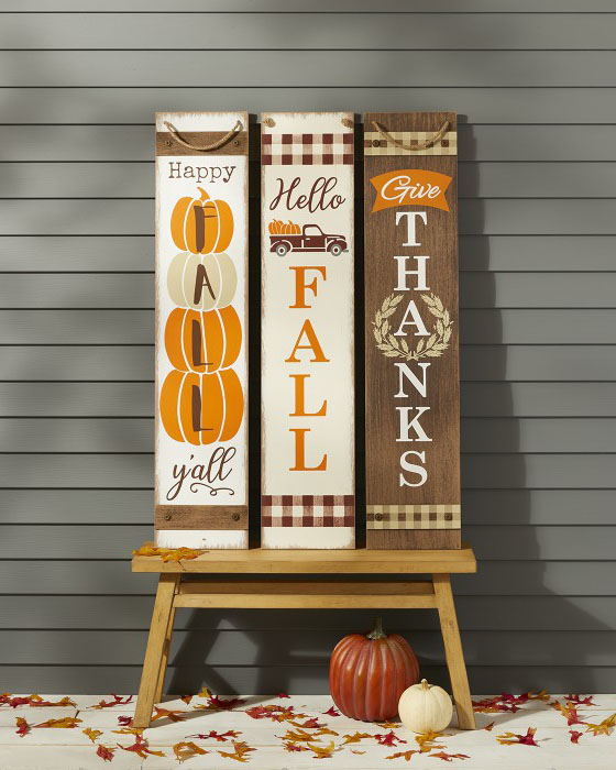 three fall front porch signs featuring happy fall y'all, hello fall and give thanks