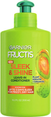 GARNIER Fructis shampoo/conditioner 11.3-13 oz or leave-in conditioner 10.2 oz.