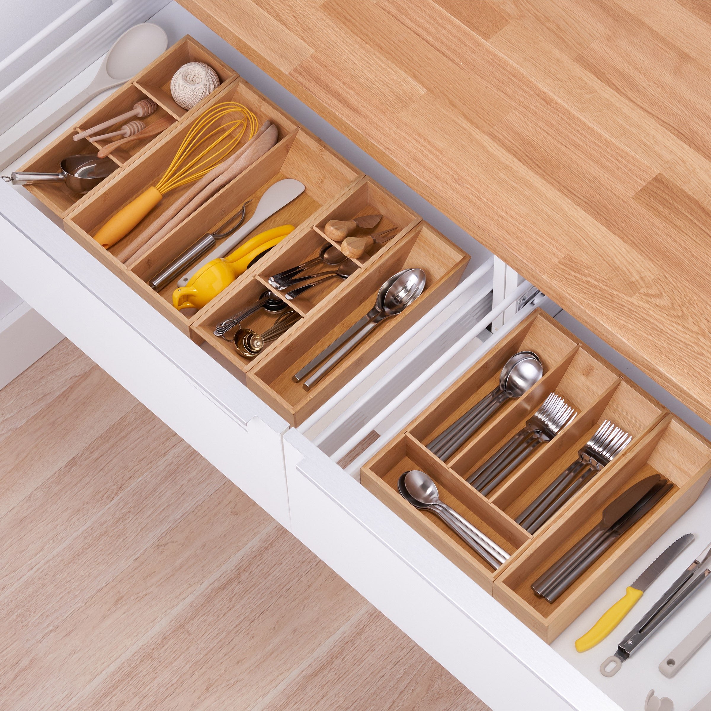 12. TRINITY 6-Piece Bamboo Drawer Organizer — $38.99